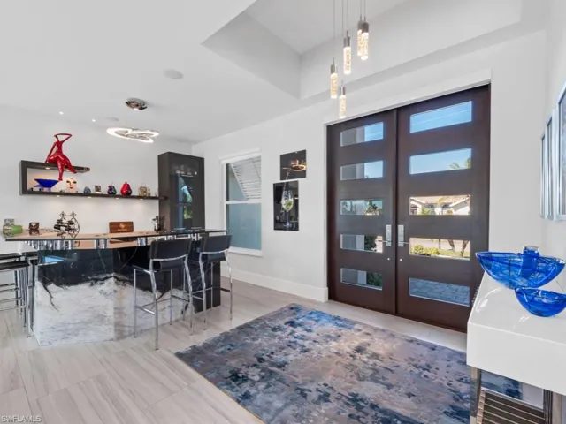 Foyer with french doors and indoor bar