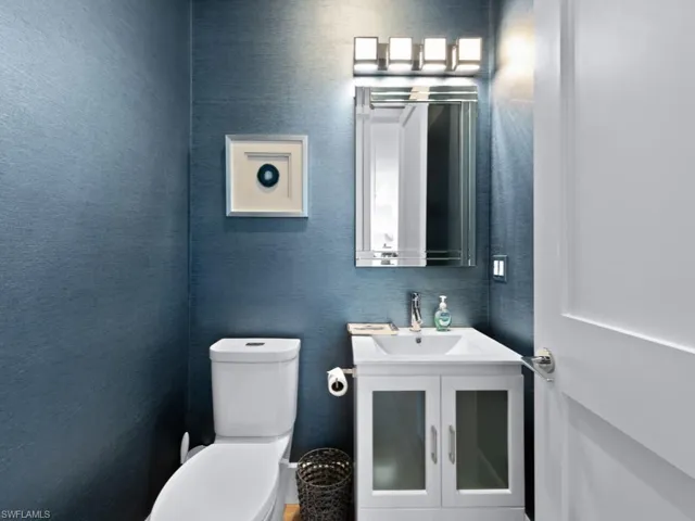 Bathroom with vanity and toilet