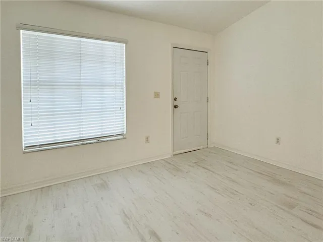 Spare room featuring light hardwood / wood-style flooring