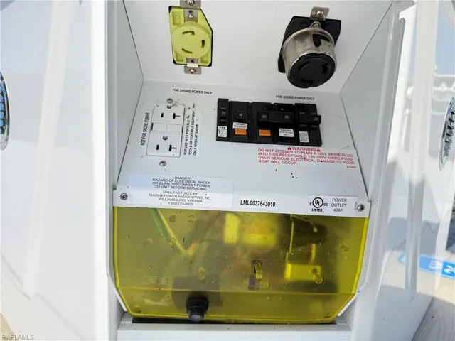 Outdoor electrical pedestal featuring multiple power outlets and integrated circuit breakers