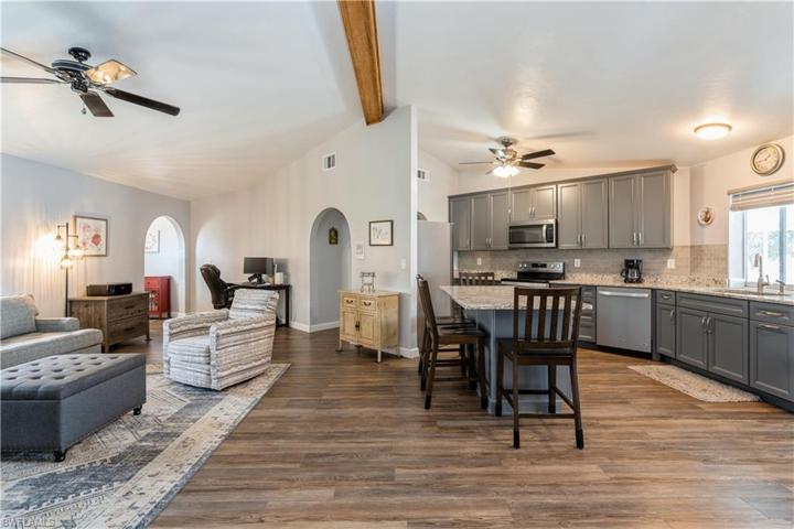ENJOY THE WATERPROOF LUXURY VINYL FLOORING IN ALL MAIN LIVING AREAS