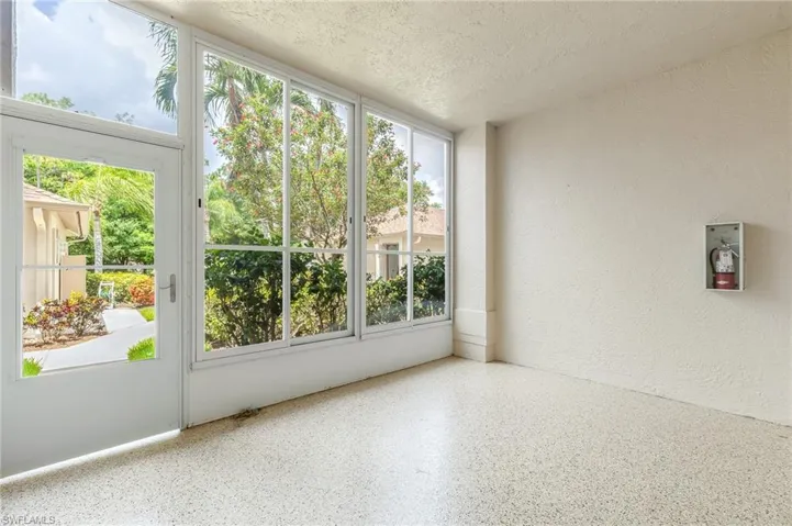 West facing lanai to walkway and your garage