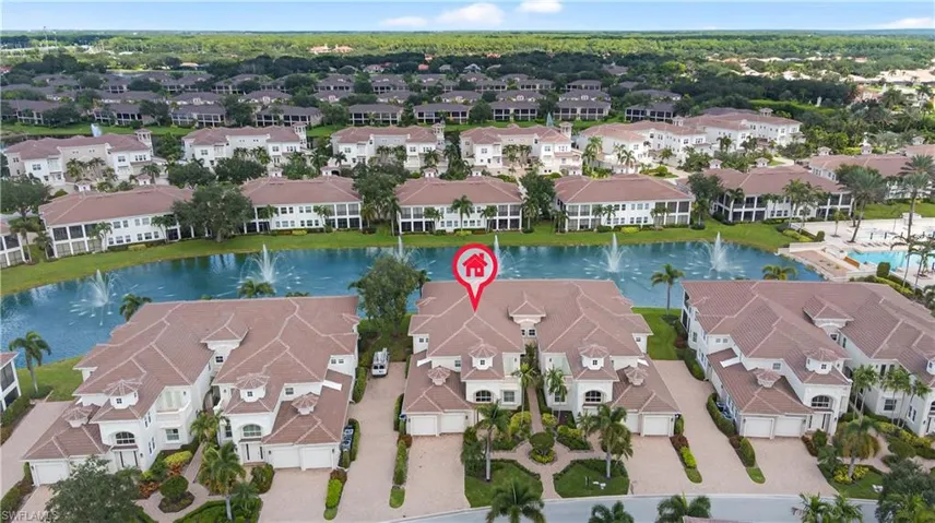 Aerial view of property's location featuring a large body of water