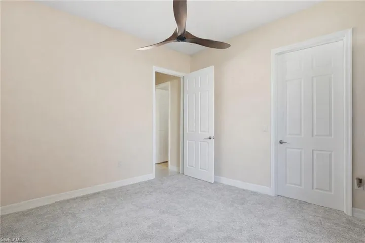 3rd BedroomCloset with built in shelving, bathroom right outside the door