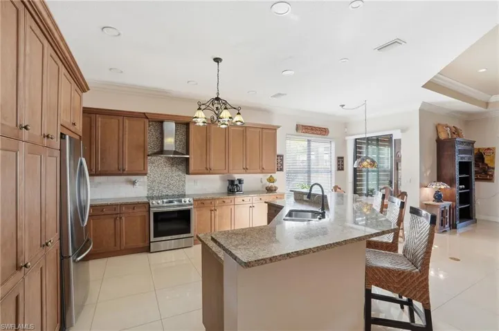 Spacious KitchenCabinets feature roll out shelving, plenty of cabinet space, open layout, granite countertops