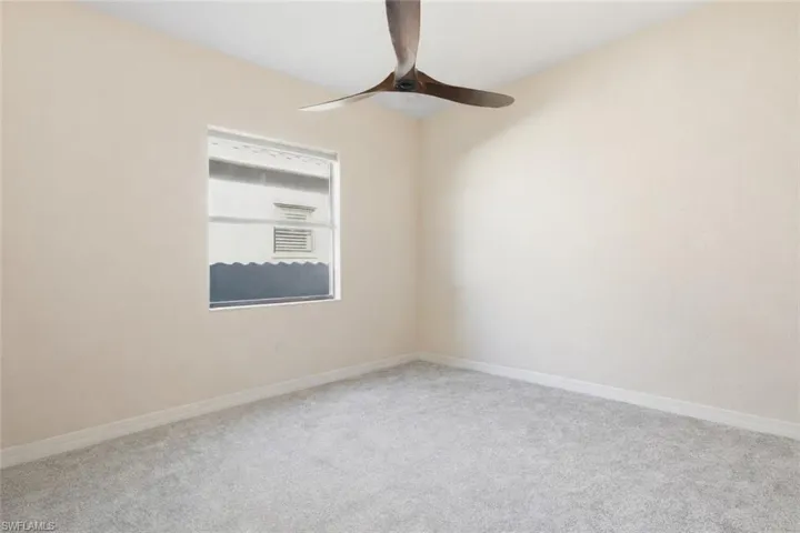 3rd BedroomCloset with built in shelving, bathroom right outside the door