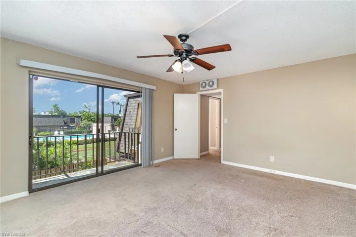 Primary bedroom (check out the view overlooking the pool, super close to the townhome)