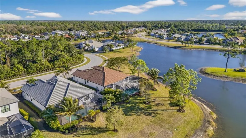 Aerial view of residential area with a large body of water