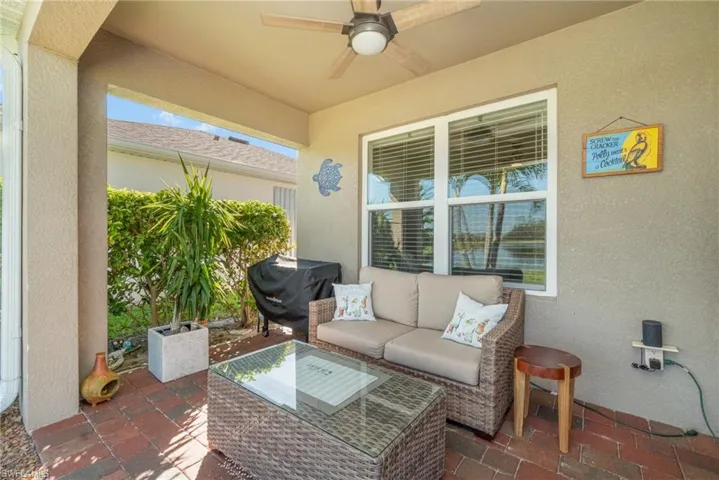 View of patio / terrace featuring ceiling fan and a grill