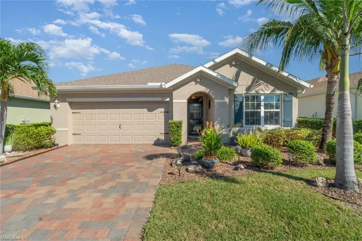 Ranch-style home featuring a garage