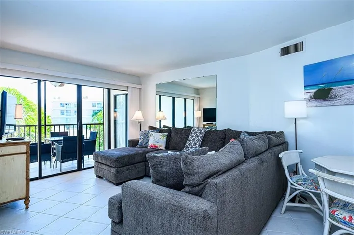 Living room featuring light tile patterned flooring