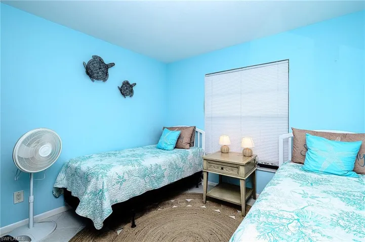 Bedroom featuring tile patterned flooring