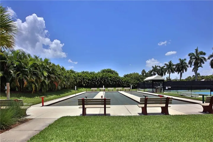View of community featuring a yard
