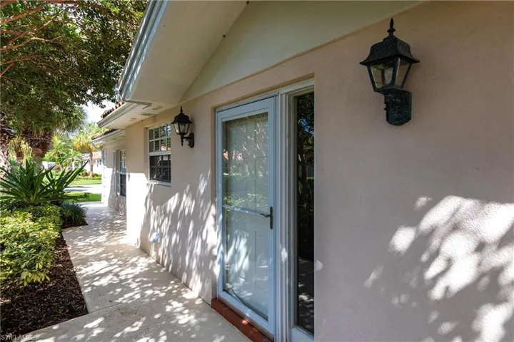 Side entry with "storm door".