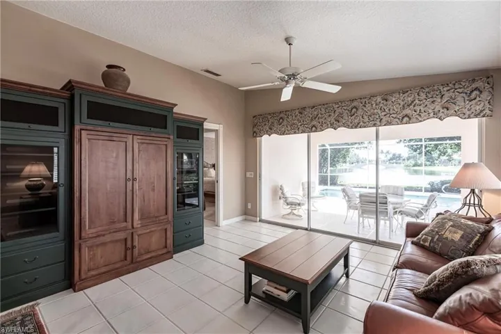 Open Den area with pool and lake views.