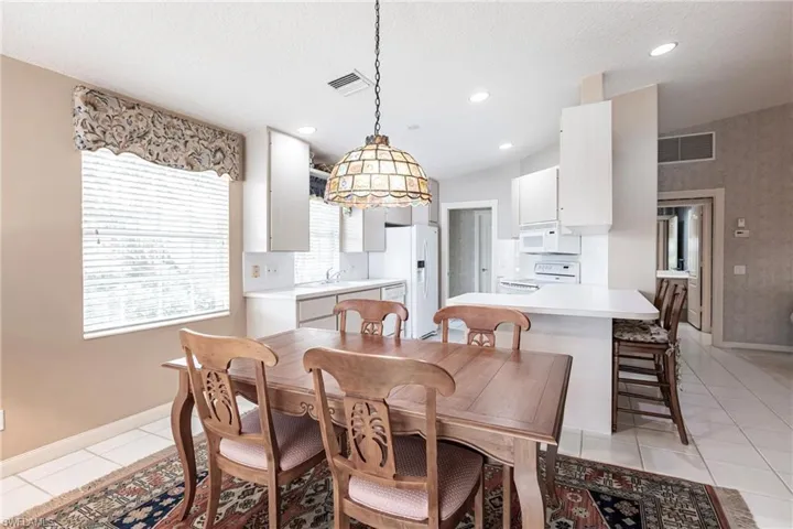 Dining area next to kitchen.