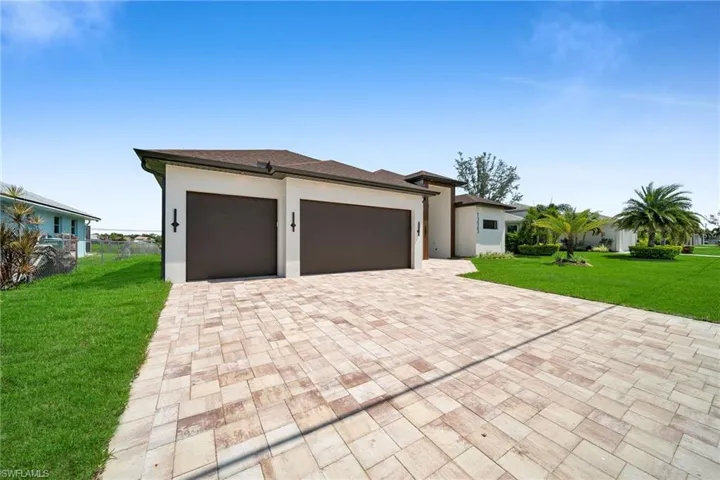 Garage with a lawn