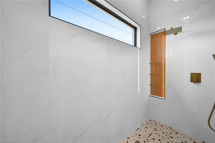 Bathroom with a tile shower