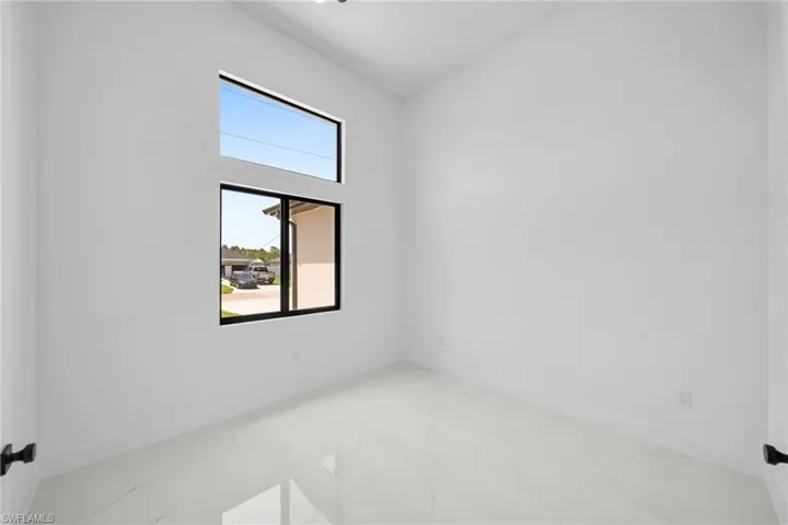 Empty room with tile patterned floors