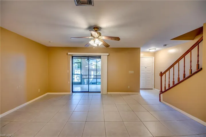 Tiled living room looking out to lanai