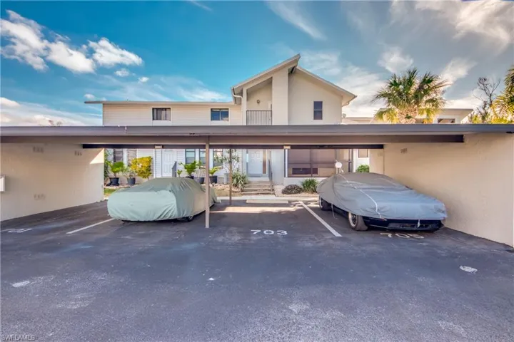 View of car parking with a carport