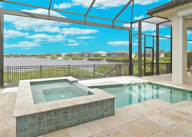 Expansive covered patio with relaxing pool & spa
