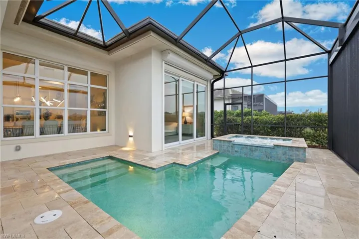 Expansive covered patio with relaxing pool & spa