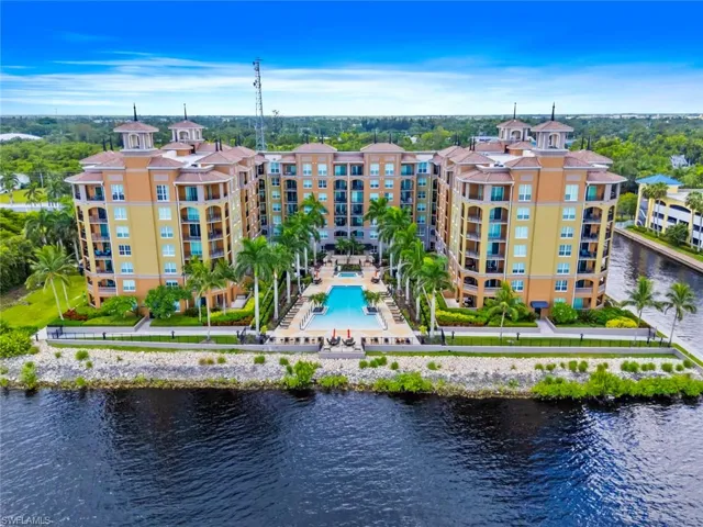 Aerial view of a large body of water and a pool area