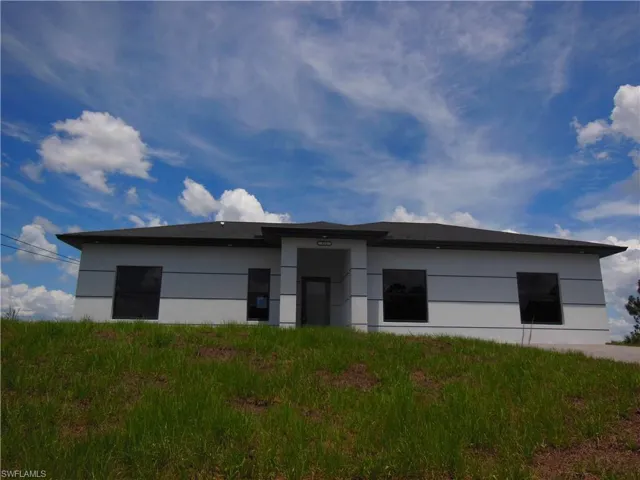 View of front of property with stucco siding