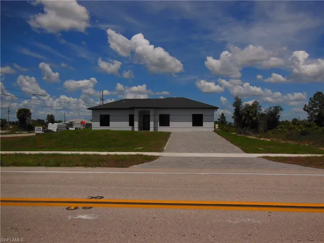View of front of home featuring driveway