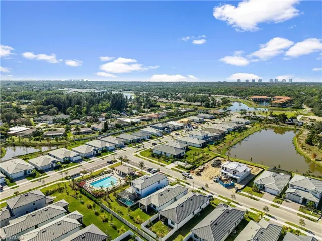 Aerial view of residential area with a nearby body of water