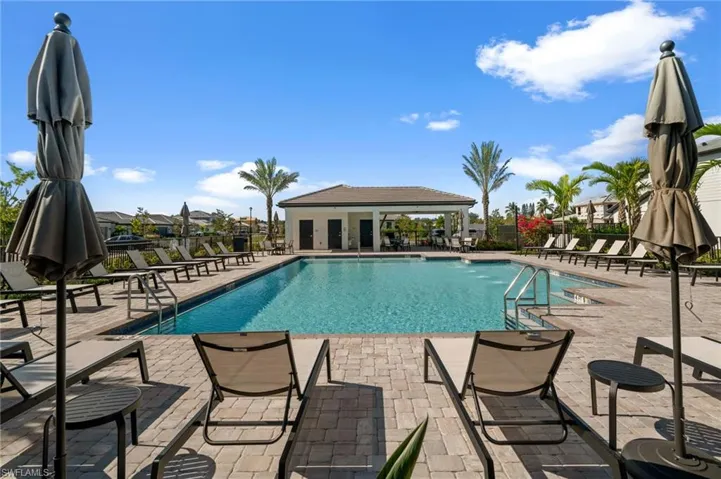 Community pool featuring a patio area