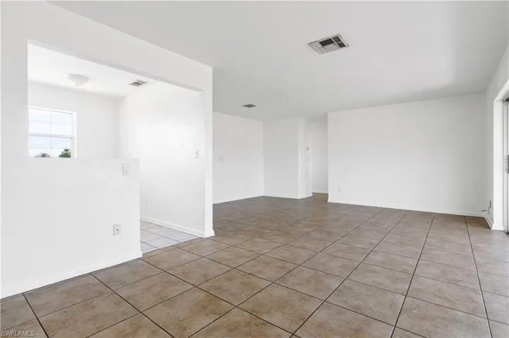 View of tiled spare room