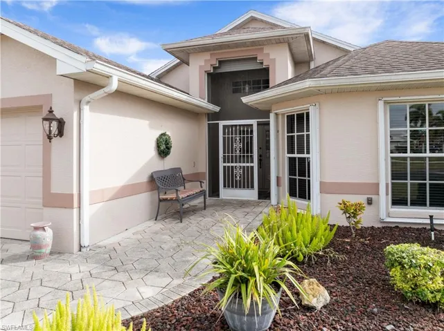 Entrance to property featuring a patio area
