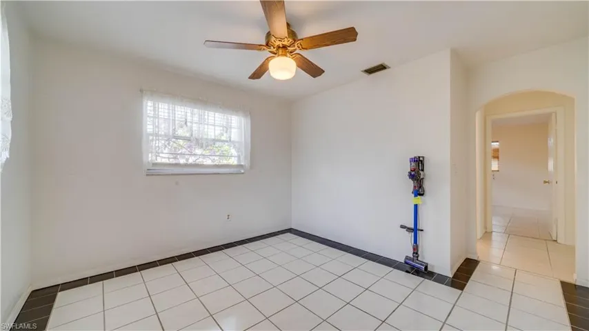 Den or flex space, hallway to guest bath