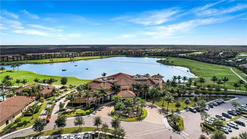 Bird's eye view of a nearby body of water and a golf club