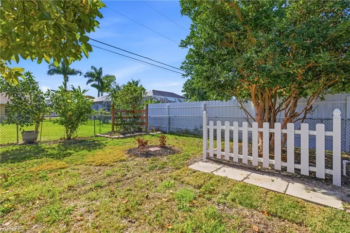 View of fenced backyard