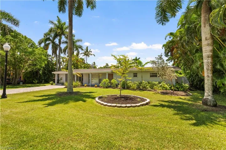 View of front of home with a front lawn