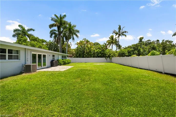 View of yard featuring a patio area and central AC