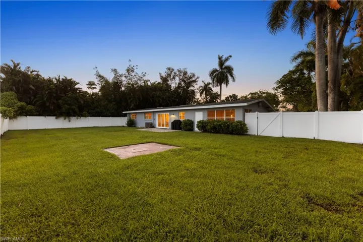 View of yard at dusk