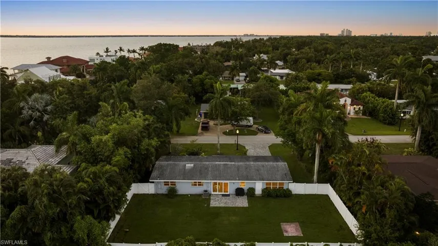 Aerial view at dusk with a water view