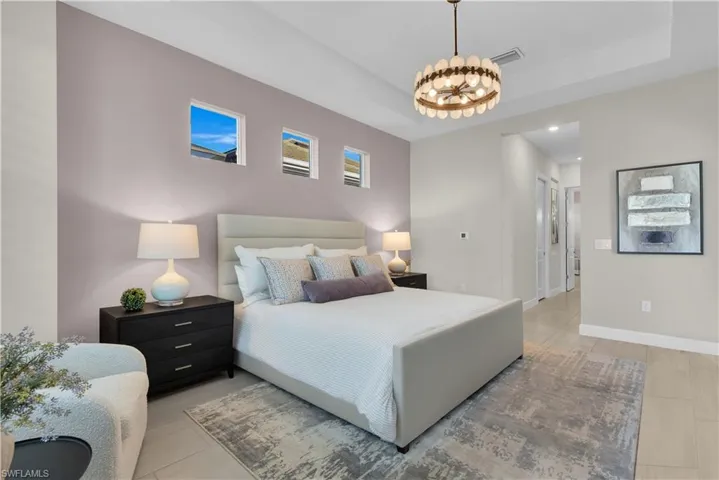 Master Suite - his/her custom California closets with cabinets, drawers, mirror, pull-out hamper, & clothes racks.