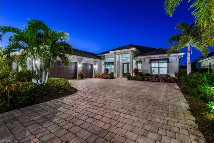 Plantation shutters throughout, Bahama shutters installed over front exterior windows, & lighting installed on garage.
