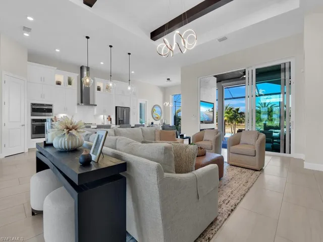 Custom Ceiling Beams in Great Room,hurricane protection with a whole home Briggs & Stratton Generator, electric hurricane screening on lanai, & all impact resistant windows/doors throughout.