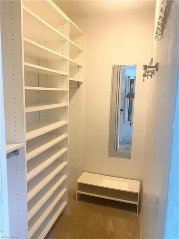 Primary has 2 walk-in closets with built ins