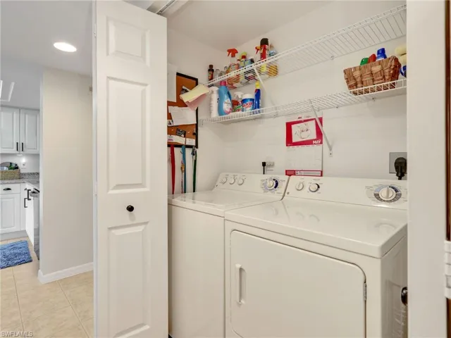 Laundry Closet with Washer and Dryer and Wire Shelving