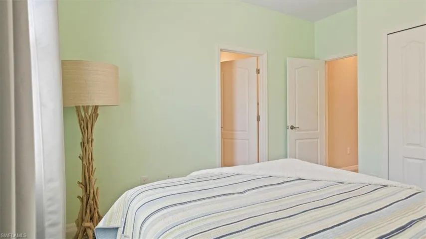 Bedroom featuring baseboards