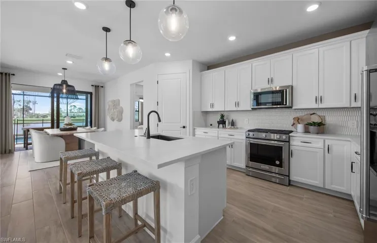 Interior photos are of a staged model home; options may vary.