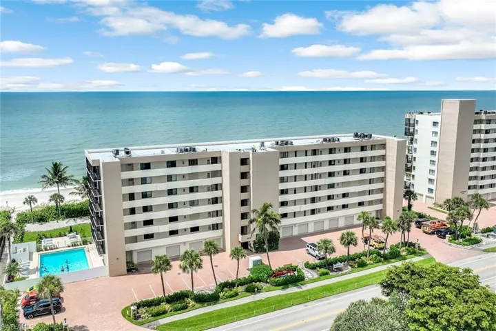 View of apartment building / complex with a water view
