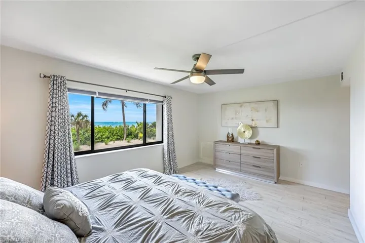 Bedroom featuring light wood-type flooring and ceiling fan